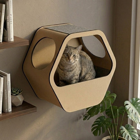 Gatitud Store hexagonal wall-mounted cat condo made of light brown MDF with grey felt top, featuring a tabby cat inside.